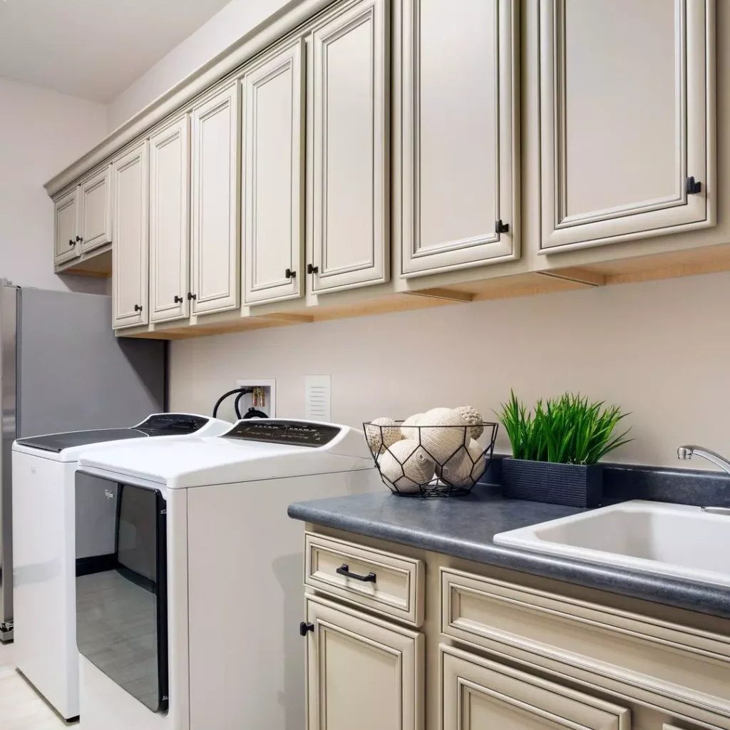 Cabinets Above the Washer and Dryer for Hidden Storage