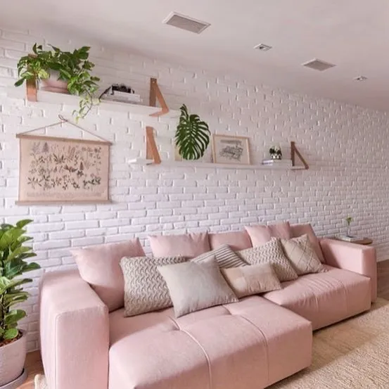 Pale Pink Couch in a Minimalist Space