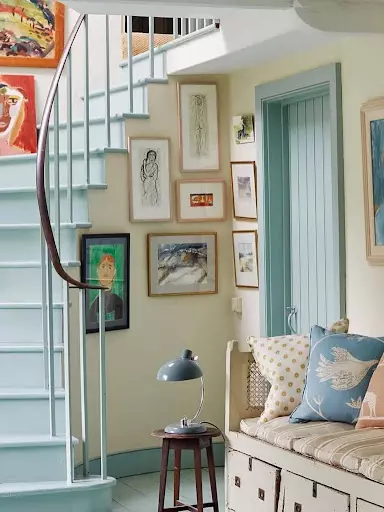 . Gallery Wall Following the Stair Angle